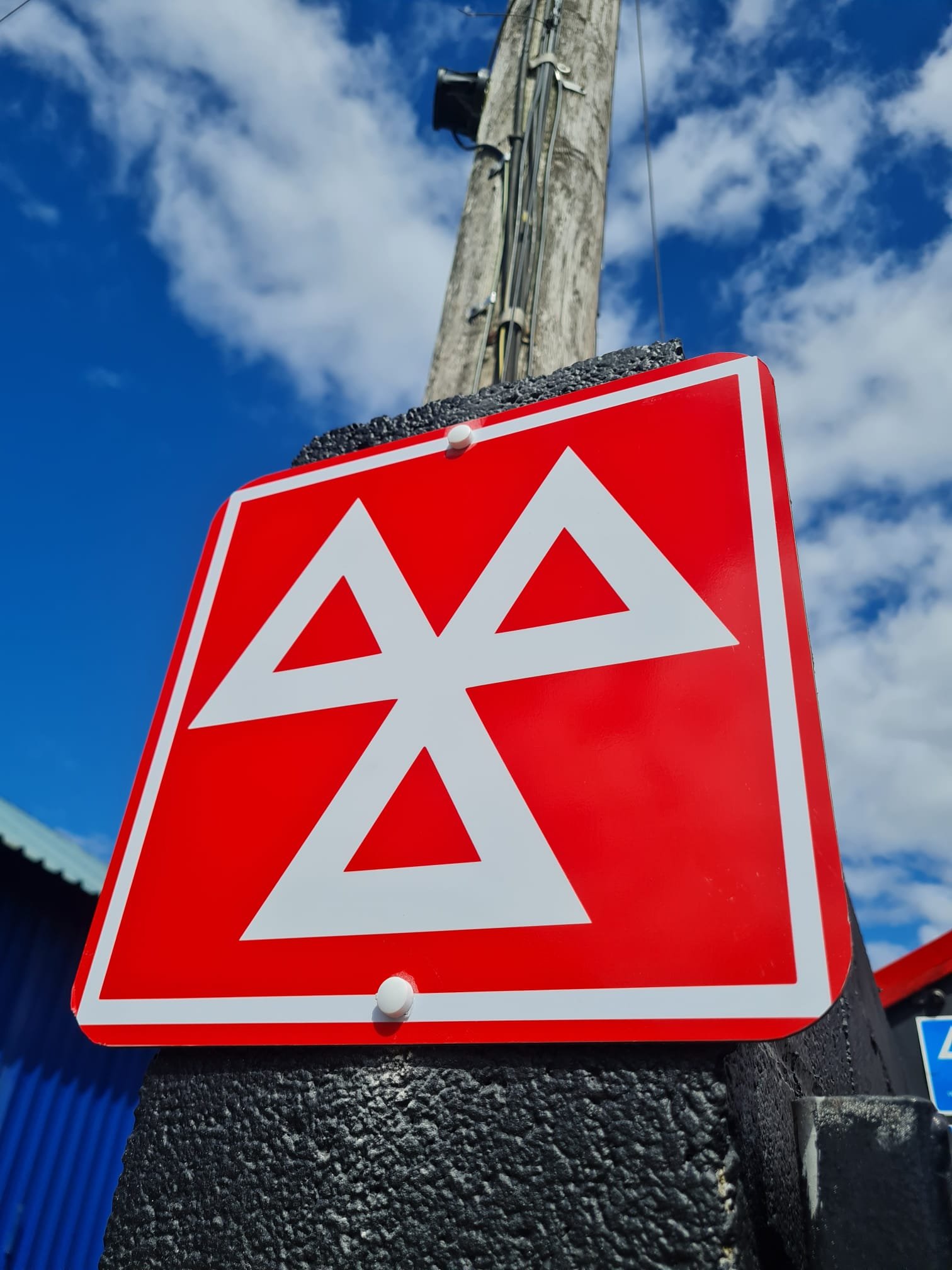 Naz's MOT Signage